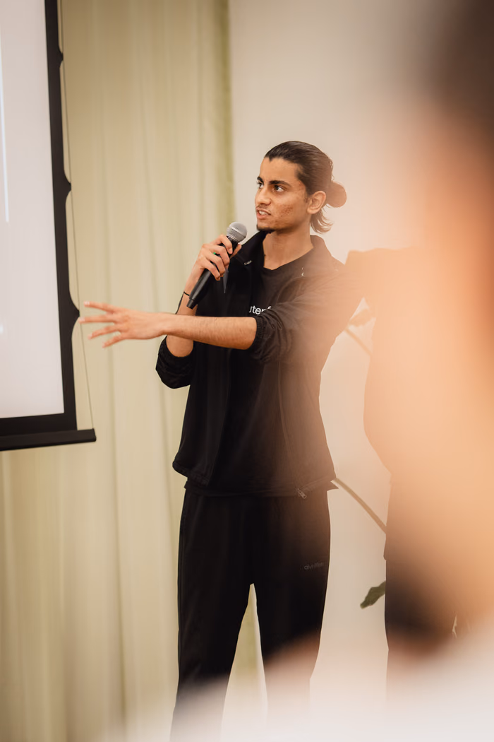 A finalist walking the judges through his idea.