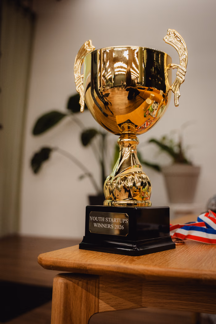 One of the trophies, waiting on a table before the results.